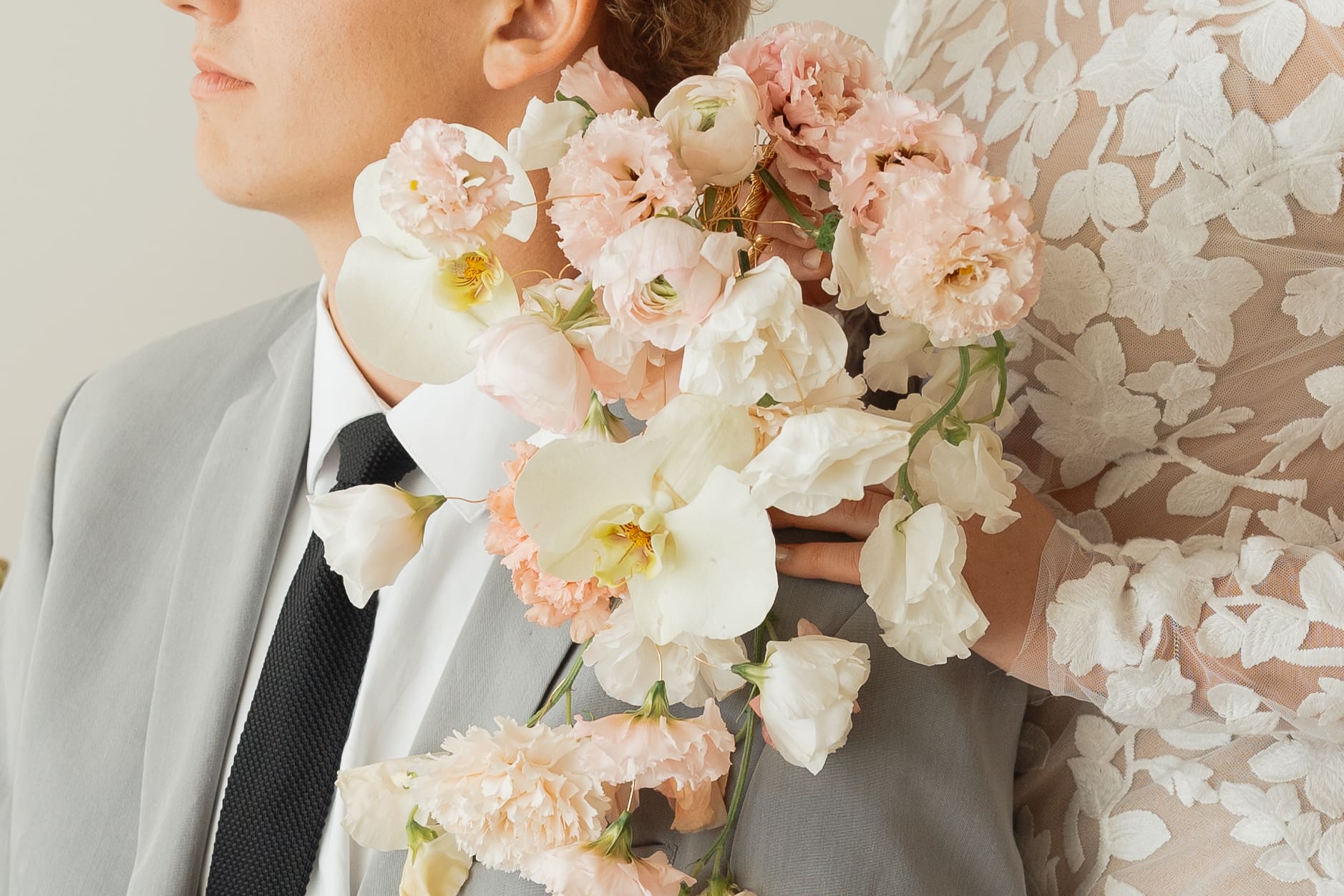 Elegant wedding ceremony setup with floral arrangements at Moments on Main, a beautiful option among wedding venues in Utah County.