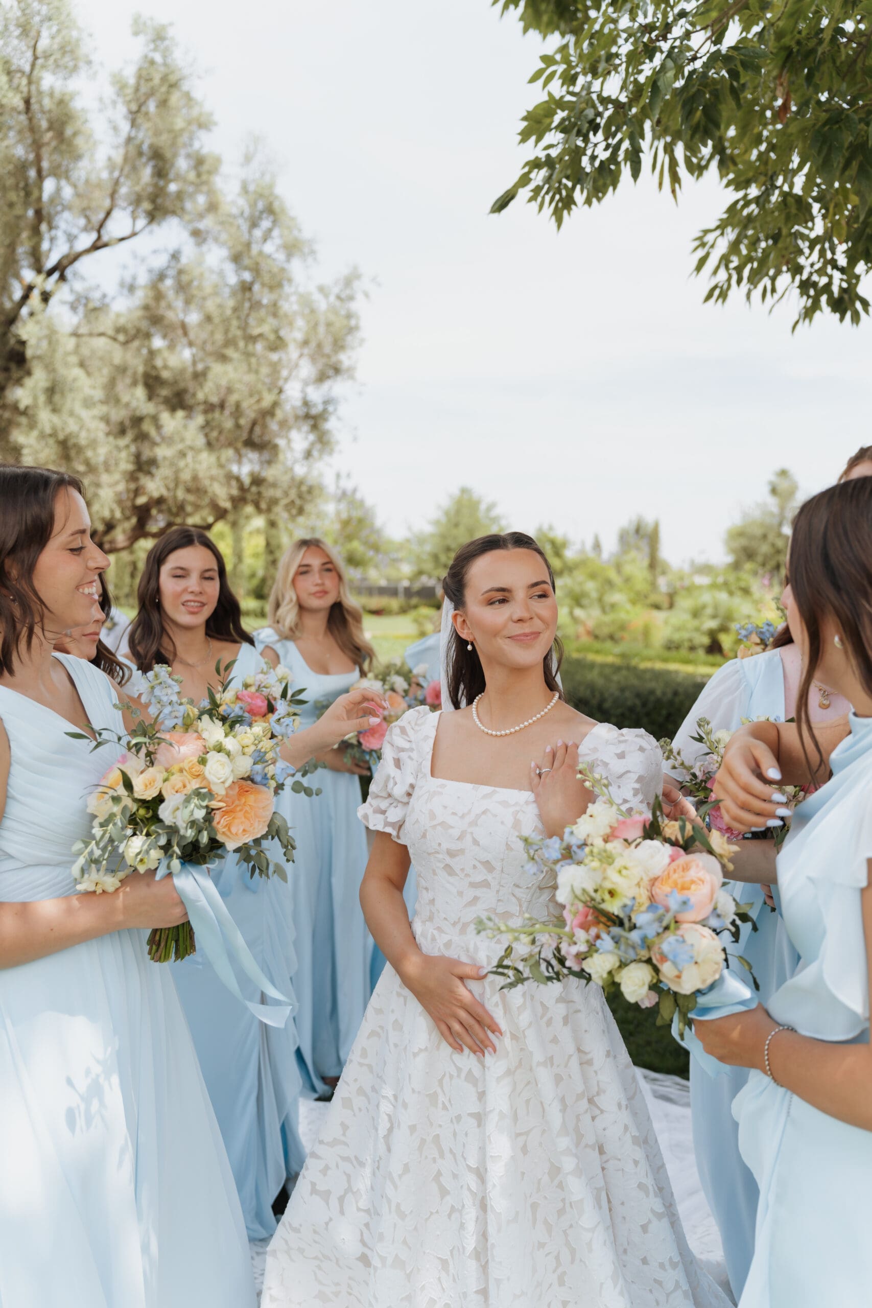 bride looking at her bridesmaids