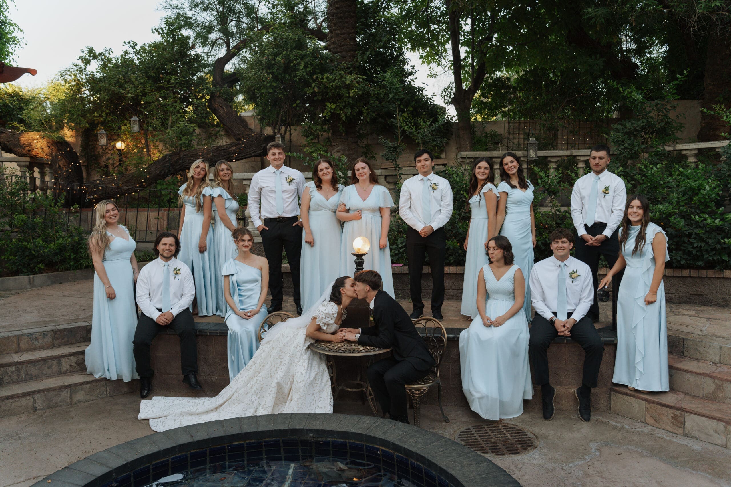 friends surround the newlywed couple
