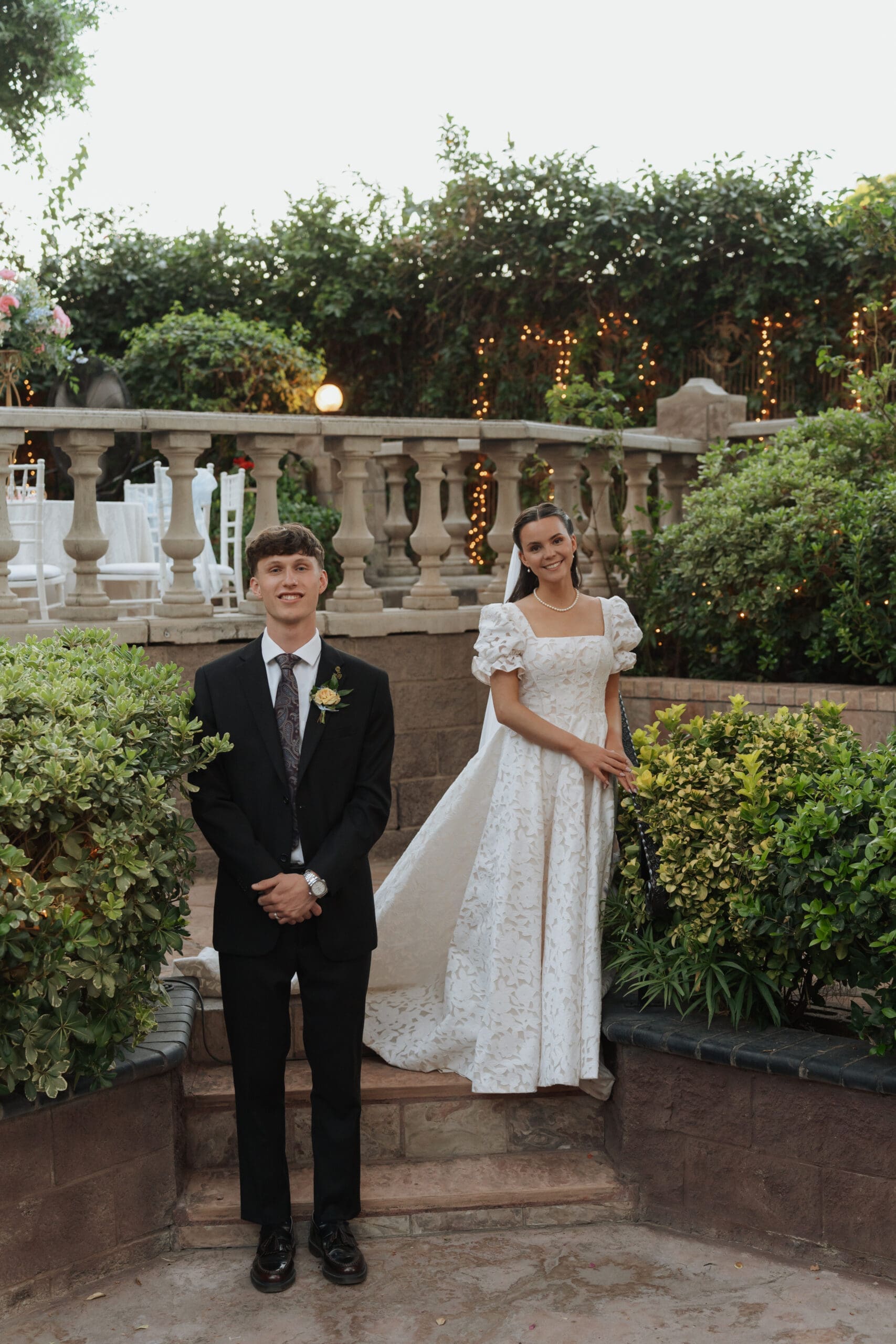 husband and wife on stairs